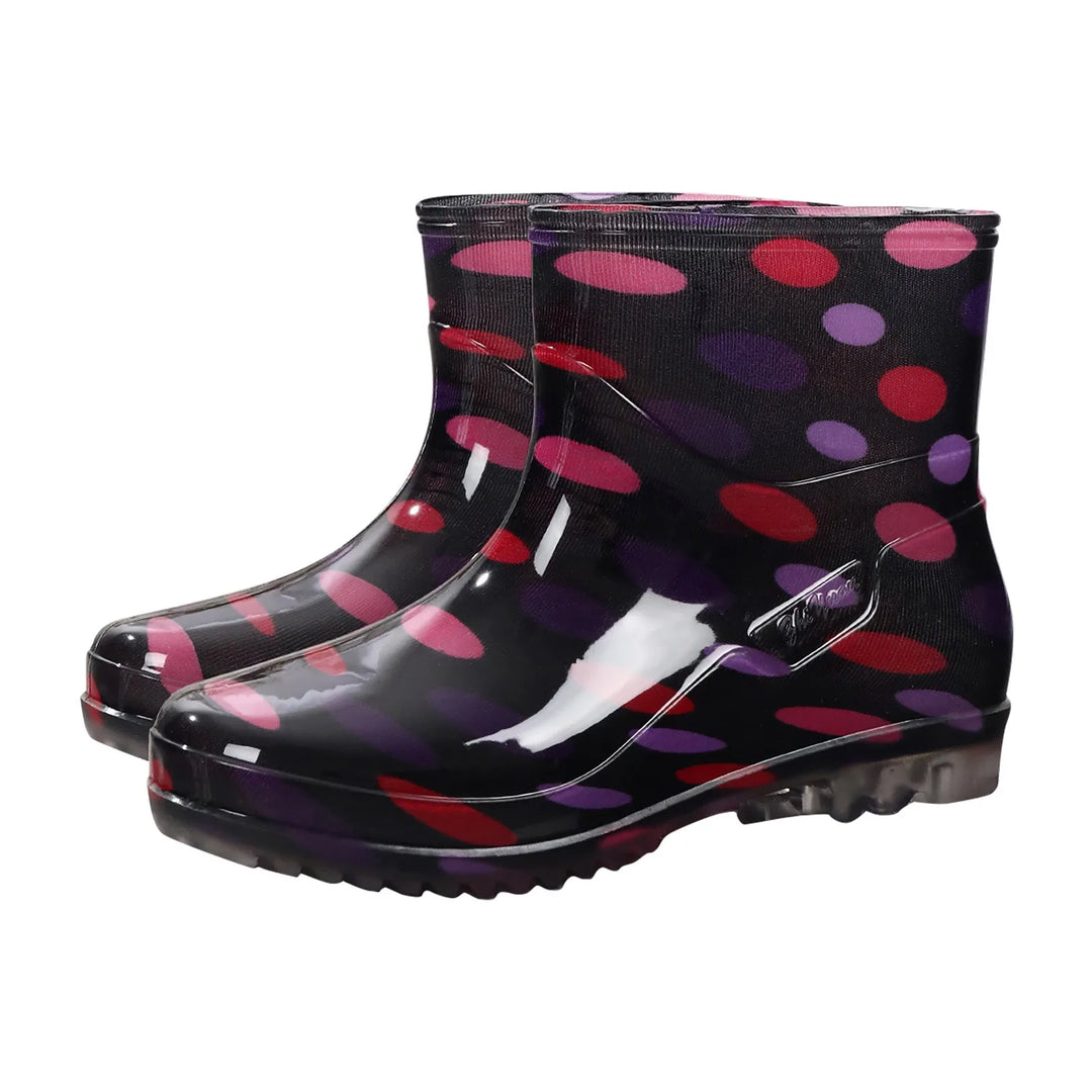 Women's black rubber Wellington boots waterproof slip-on mid-calf with outdoor traction sole
