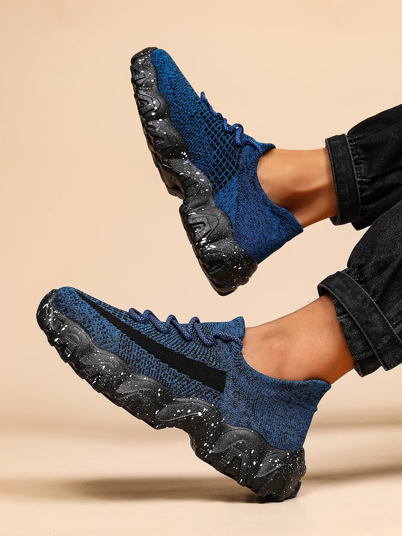 Unisex knit sneaker with cushioned EVA sole, lightweight breathable mesh upper for all-day comfort