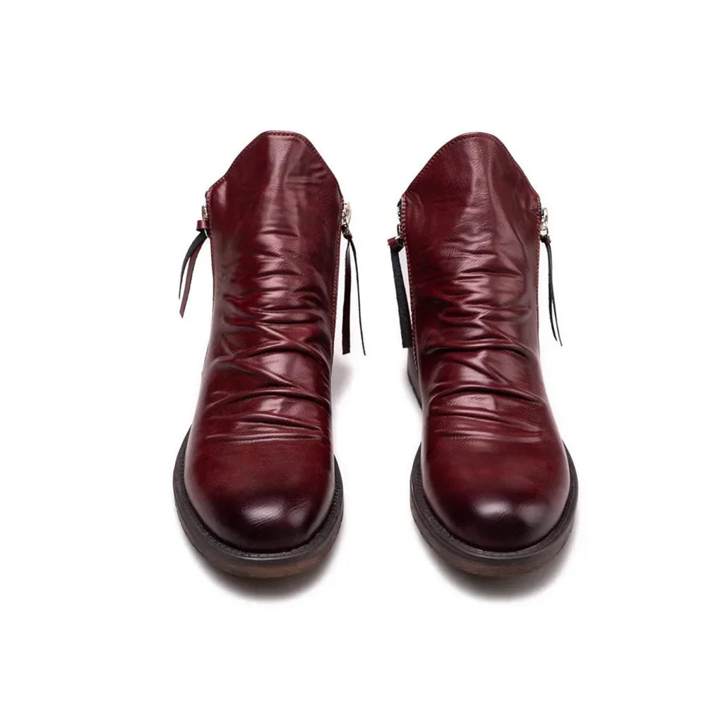 Handcrafted black leather Chelsea boots with zipper closure and all-day comfort for professionals