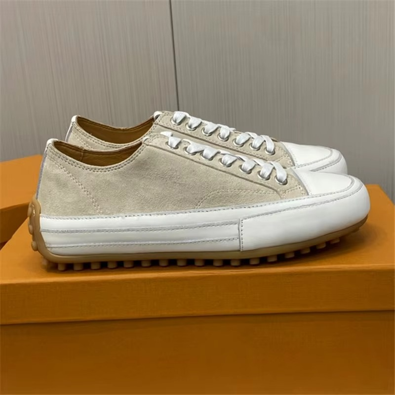 Women's casual white sneakers with round toe and cross lacing design for all-day comfort and support
