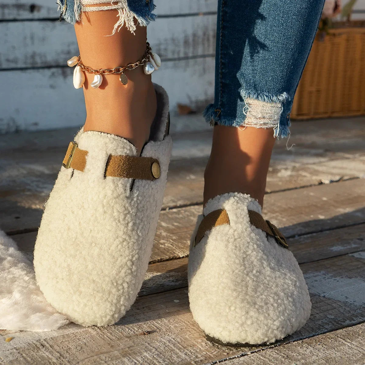 Women's cozy slip-on slippers with ultra-soft plush interior lining for warm indoor relaxation