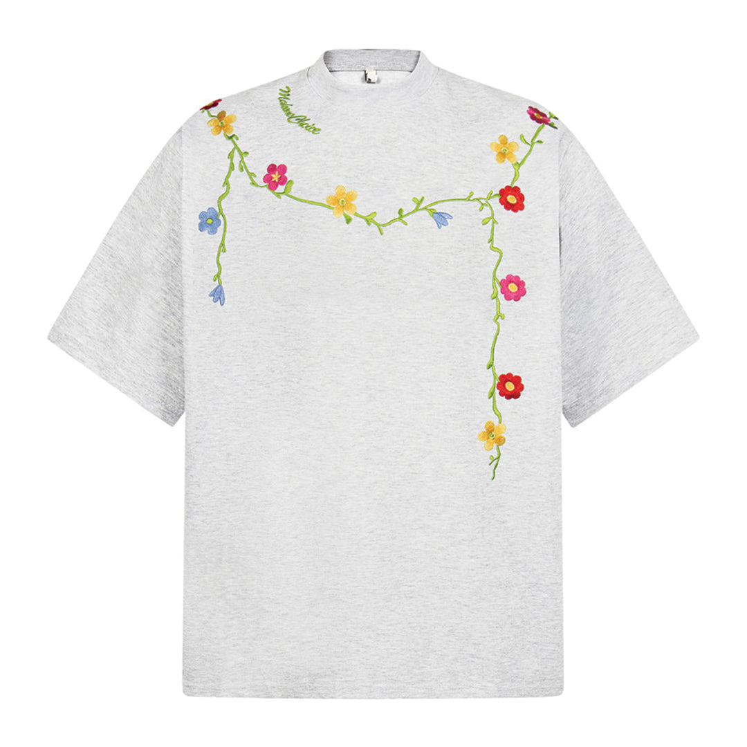 White loose fit cotton crew neck t-shirt with bold embroidered vine botanical details