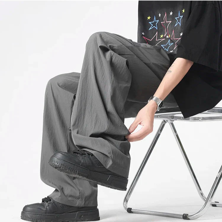 Neutral tufted parachute pants wide-leg crinkled nylon lightweight breathable urban streetwear