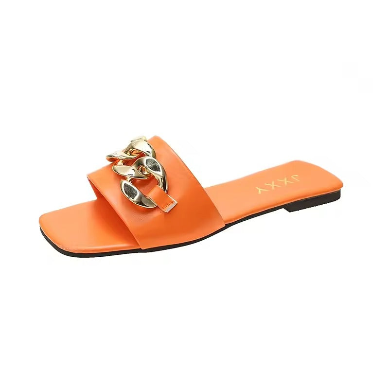 Women's vegan leather slide sandals with bold gold chunky chain accent strap, square toe, chic flat style