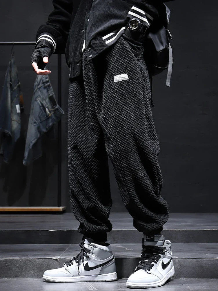 Men's dark corduroy joggers relaxed fit with waffle texture, elastic waist and ribbed cuffs