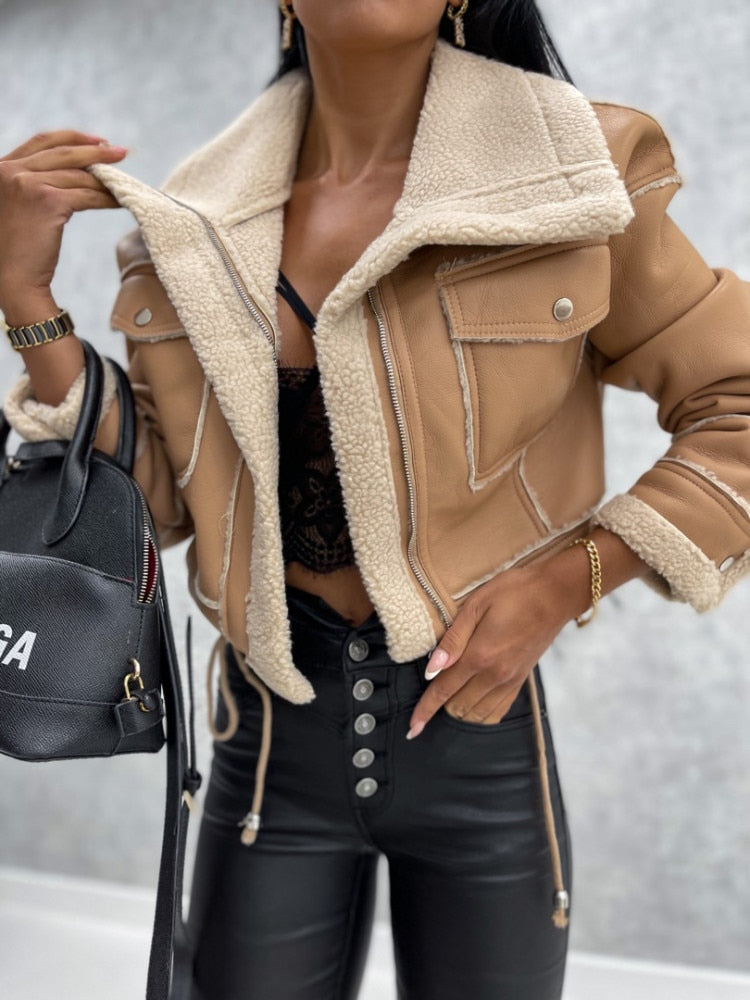 Women's cropped faux leather jacket slim fit zip closure with plush shearling lining in black