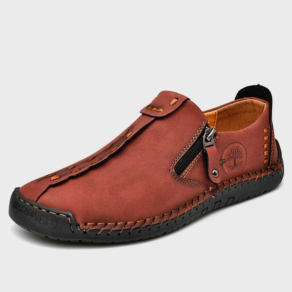 Black slip-on leather shoes with side zipper, street-style silhouette, handcrafted stitching for daily wear