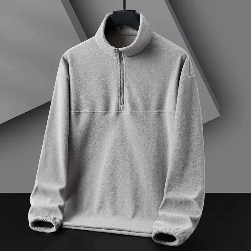 Soft gray half-zip fleece pullover minimalist high collar ultra-soft texture everyday warmth