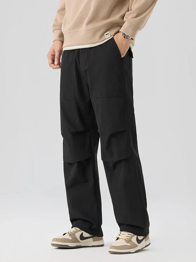 Men's water-resistant nylon cargo pants utility trousers with deep pockets for outdoor adventures