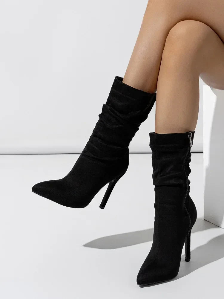 Black velvet stiletto boot with slouchy shaft and pointed toe, chic evening heel for women
