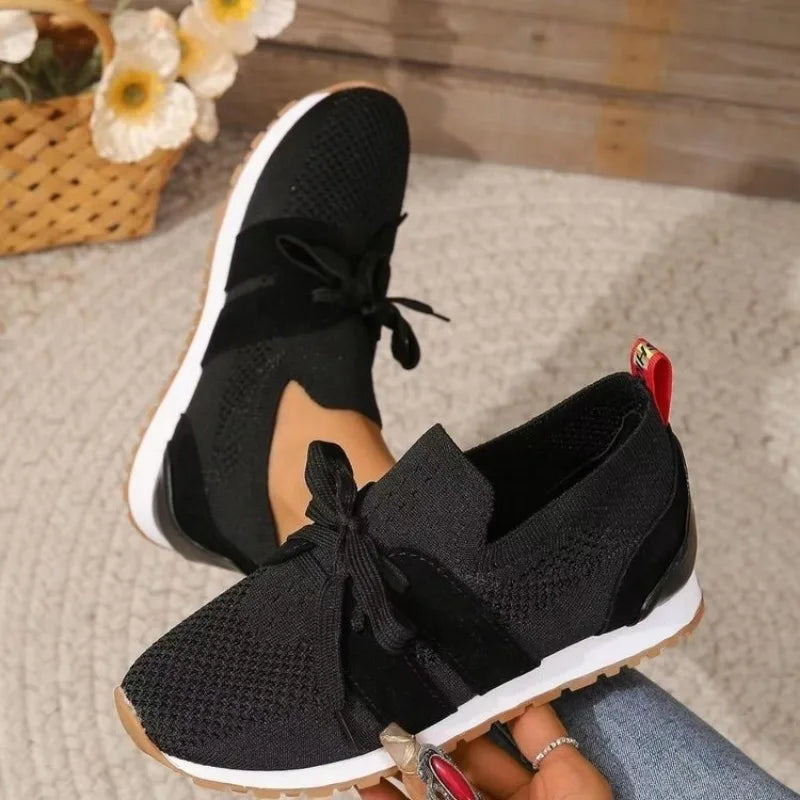 Women's white orthopedic sneakers with elegant silhouette, arch support, and all-day comfort design