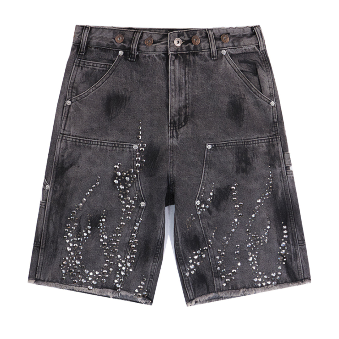Blue denim carpenter shorts with rhinestone flame studs, loose wide-leg fit, and multiple pockets