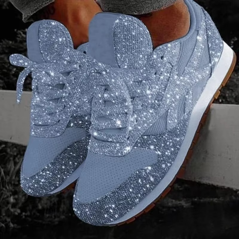 Women's silver glitter mesh platform sneakers with lace-up closure and lightweight sparkle sole