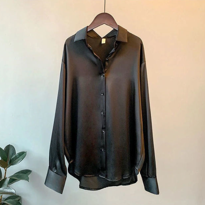 Women's loose fit satin button-down blouse relaxed silhouette smooth luxurious drape effortless chic