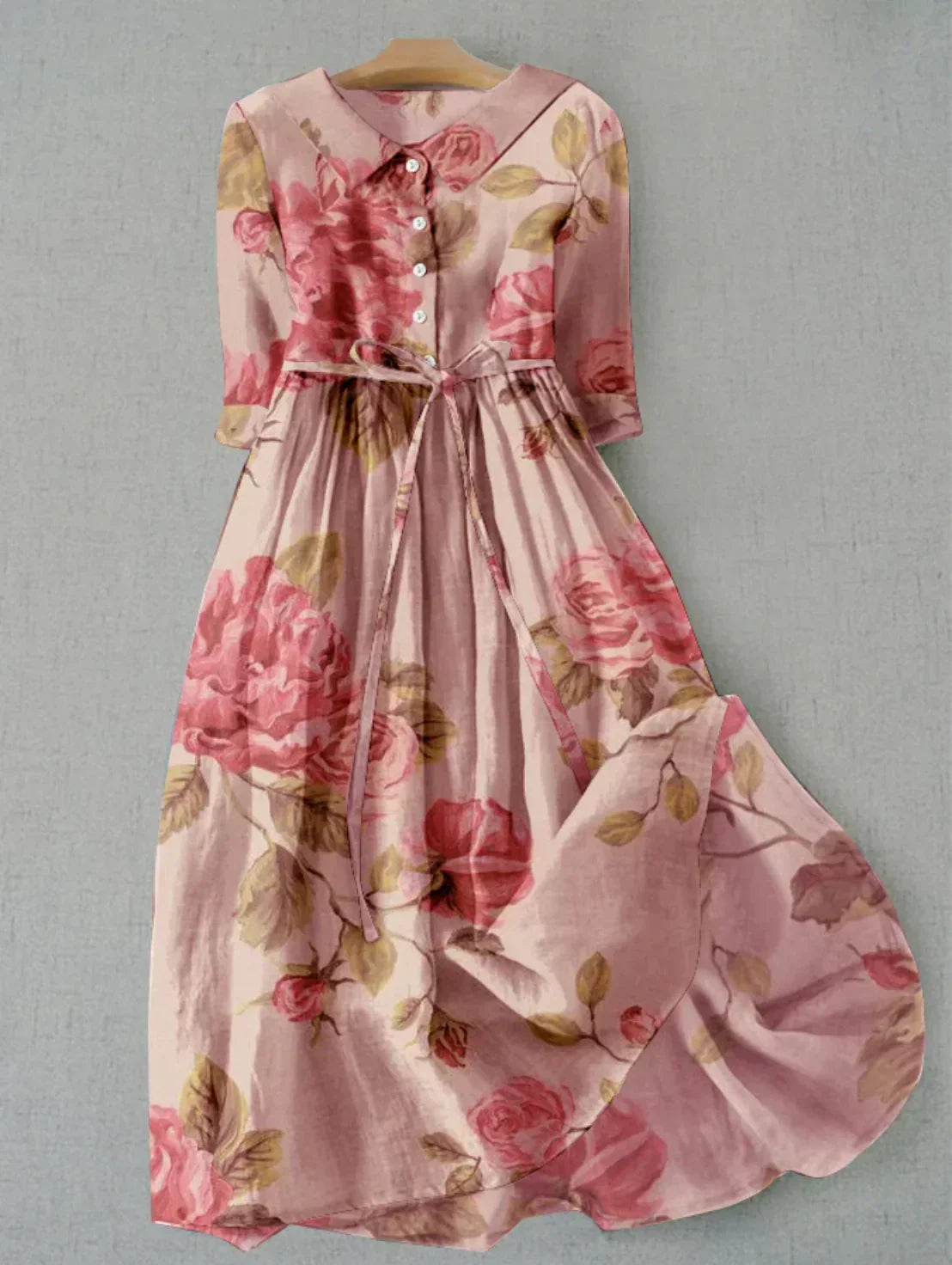 Women's pastel floral midi dress with romantic feminine silhouette and delicate all-over floral print