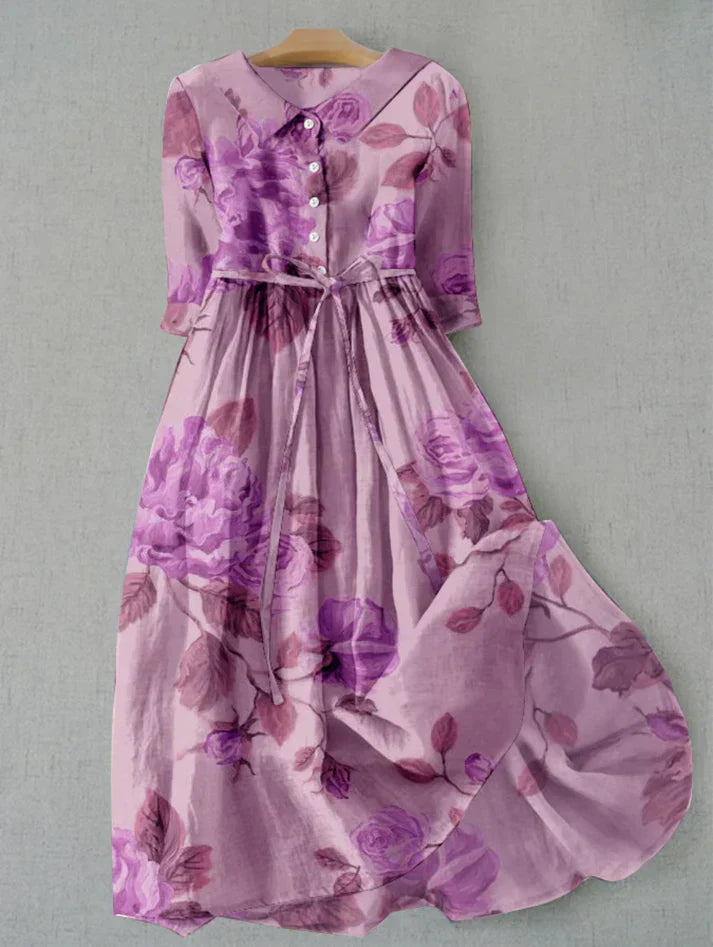 Women's pastel floral midi dress with romantic silhouette and delicate all-over print for summer