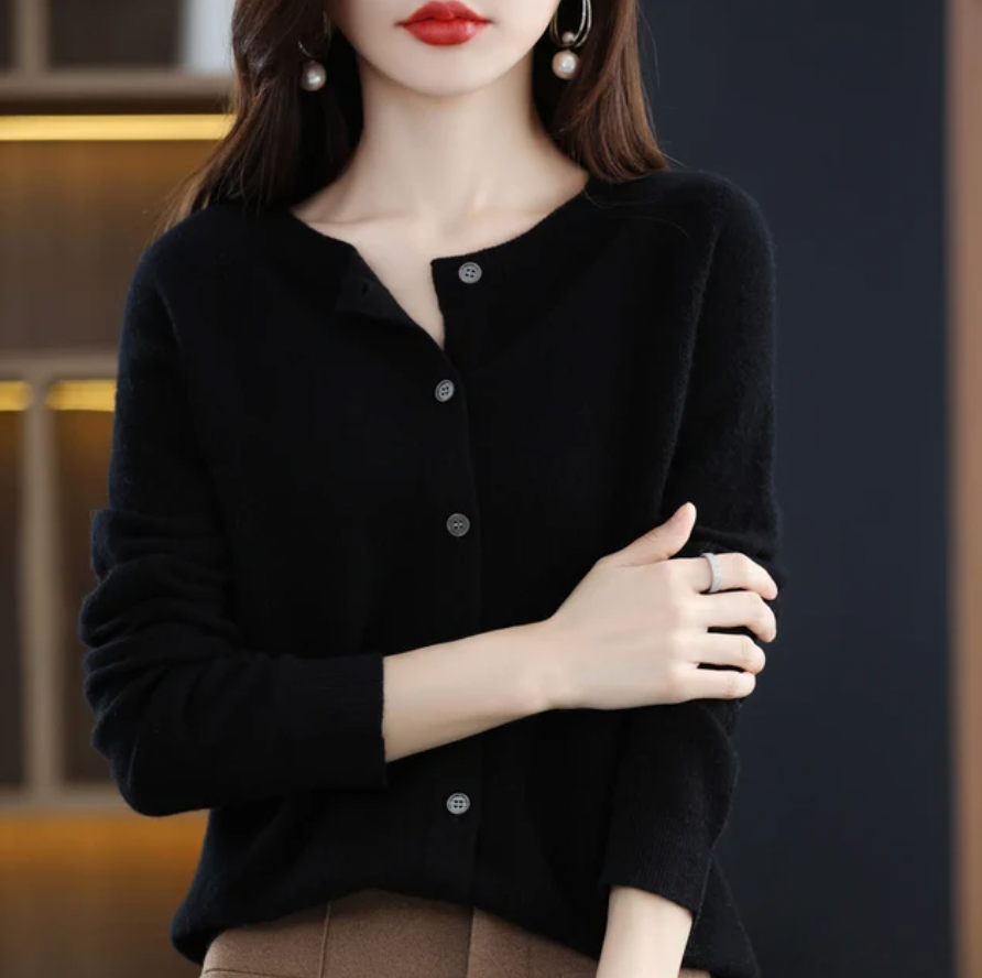 Women's classic button-front winter cardigan in neutral tone with polished silhouette