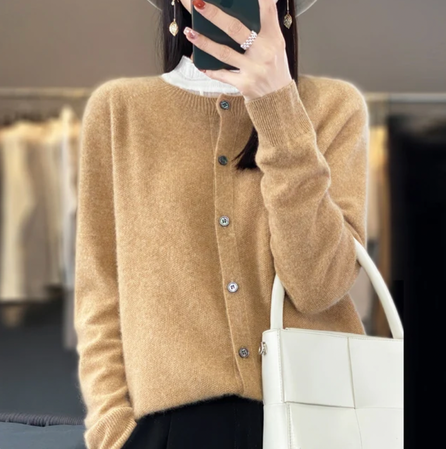 Women's classic button-front winter cardigan in neutral tones with refined silhouette and polished closure