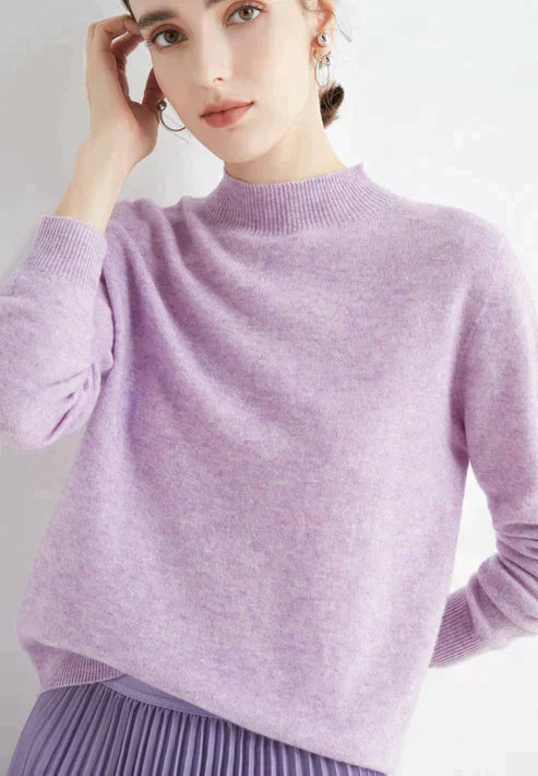 Warm women's long-sleeve knit sweater in cozy luxury fabric with flattering everyday silhouette