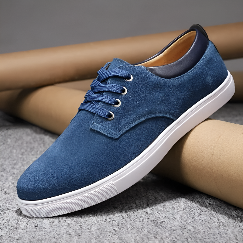 Men's white lace-up court sneakers with metallic eyelets, clean contemporary design for everyday wear