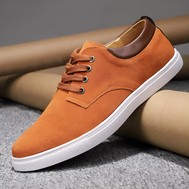 Men's white lace-up court sneakers with metallic eyelets, clean contemporary design for everyday wear