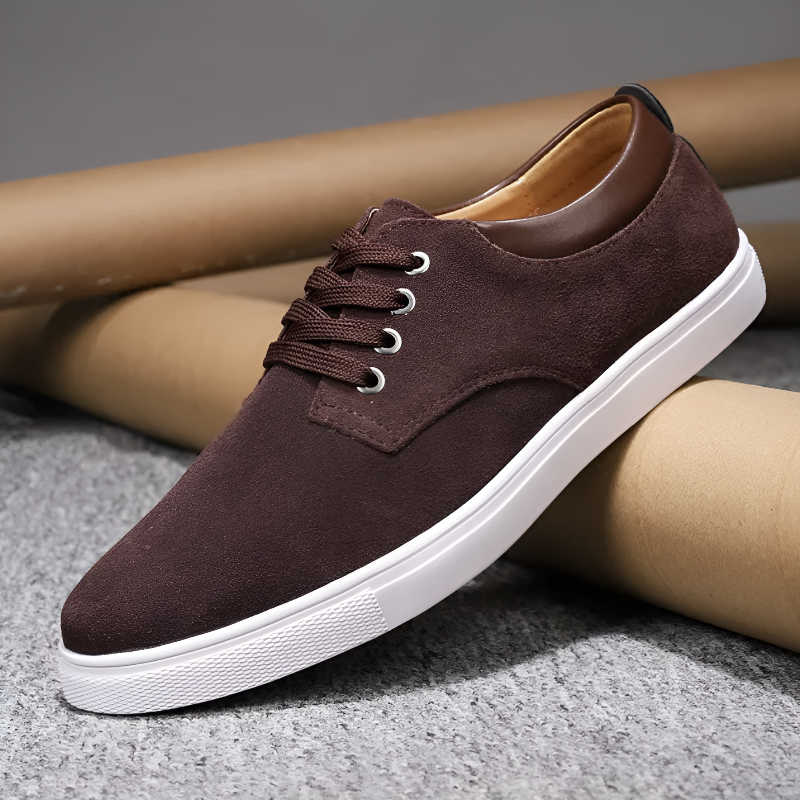 Men's white lace-up court sneakers with metallic eyelets, clean contemporary design for everyday wear