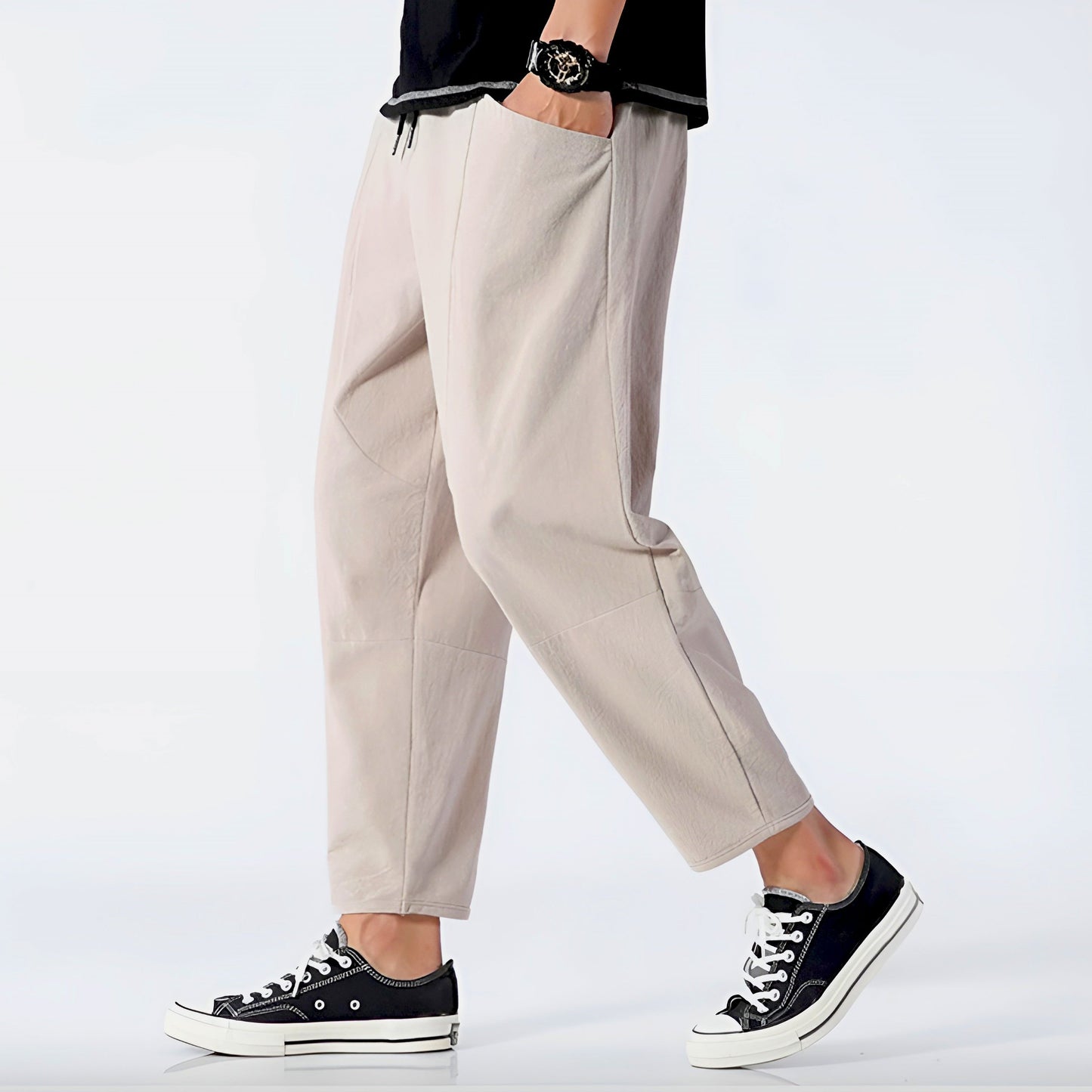 Beige cropped relaxed-fit linen blend pants with adjustable drawstring waist for urban everyday wear