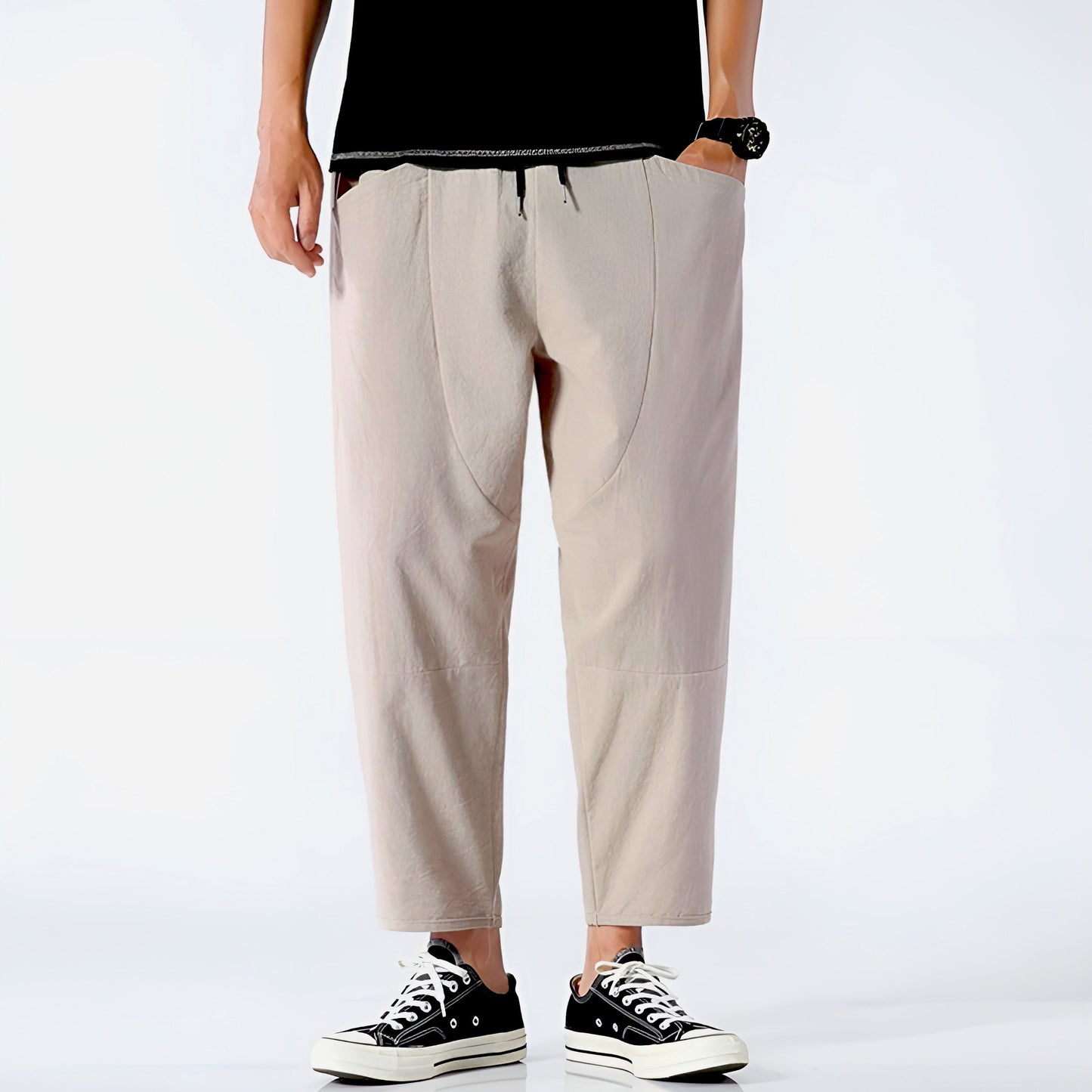 Beige cropped relaxed-fit linen blend pants with adjustable drawstring waist for urban everyday wear