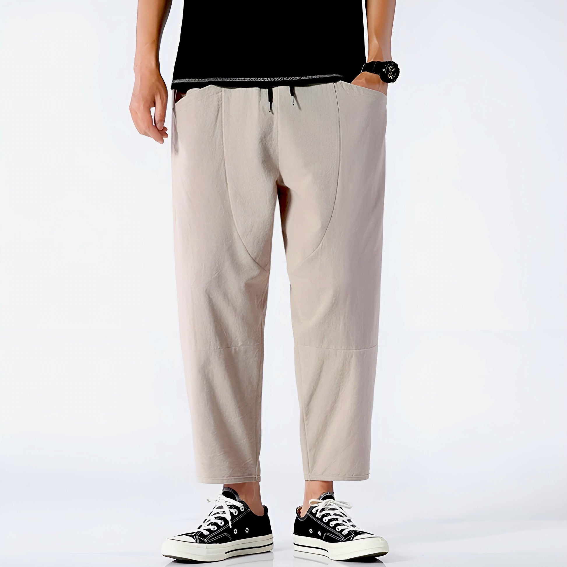 Beige cropped relaxed-fit linen blend pants with adjustable drawstring waist for urban everyday wear