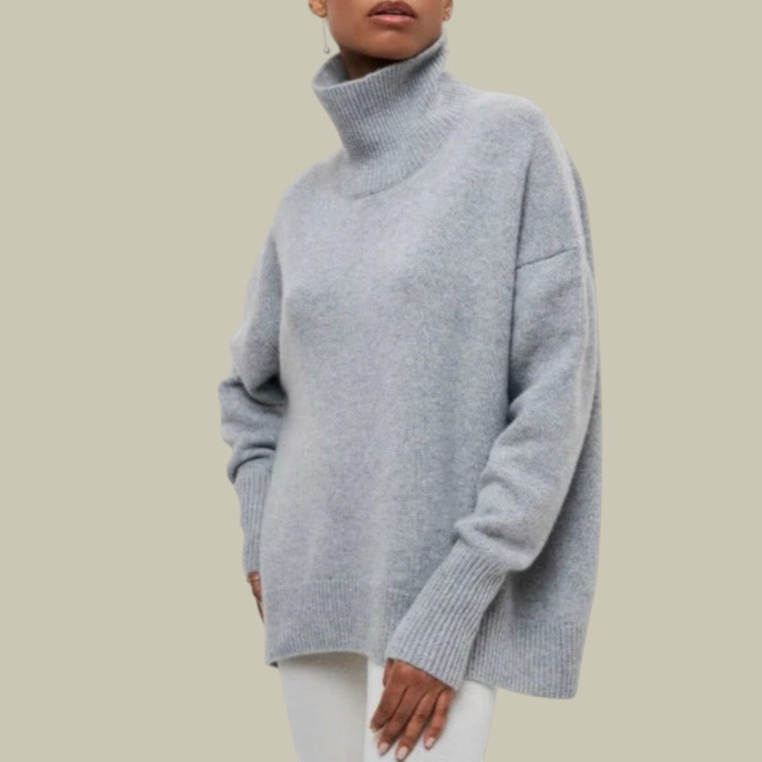 Women's oversized turtleneck sweater in winter tones, relaxed loose fit with cozy snug collar