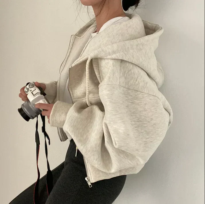 Women oversized zip-up winter jumper cozy soft knitwear sustainable casual silhouette all-day comfort