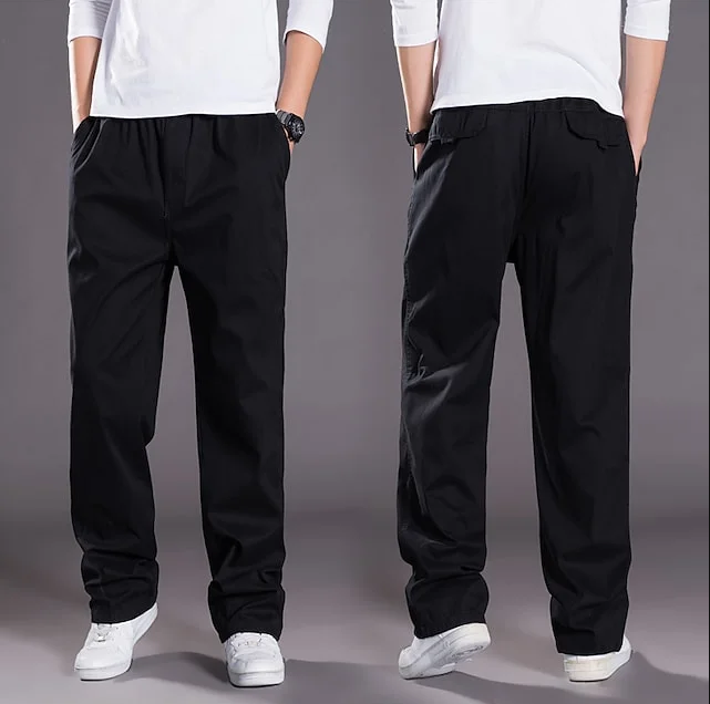 Dark olive green men's cargo pants relaxed fit with multiple utility pockets for outdoor adventures