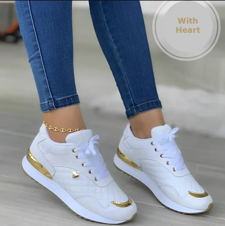 Women's white orthopaedic trainers with structured support design for all-day comfort and sustainable style