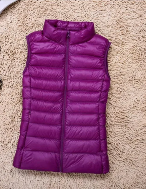 Women's ultralight packable down jacket in sleek design, lightweight cold-weather insulation layer
