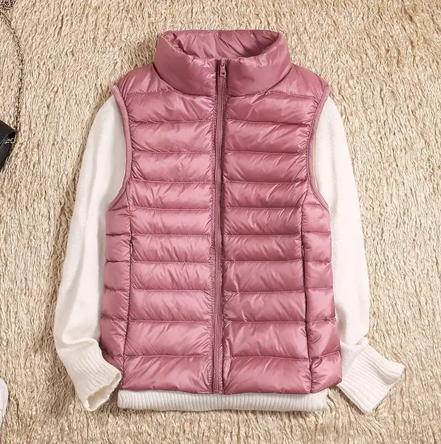Women's ultralight packable down jacket in neutral tone, sleek slim fit with sustainable insulation