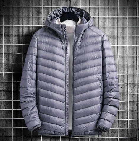 Black lightweight down jacket alpine outdoor style with quilted insulation for cold weather warmth