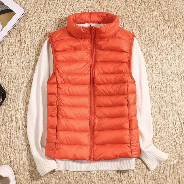 Women's ultralight packable down jacket in neutral tone, slim fit with sustainable insulation