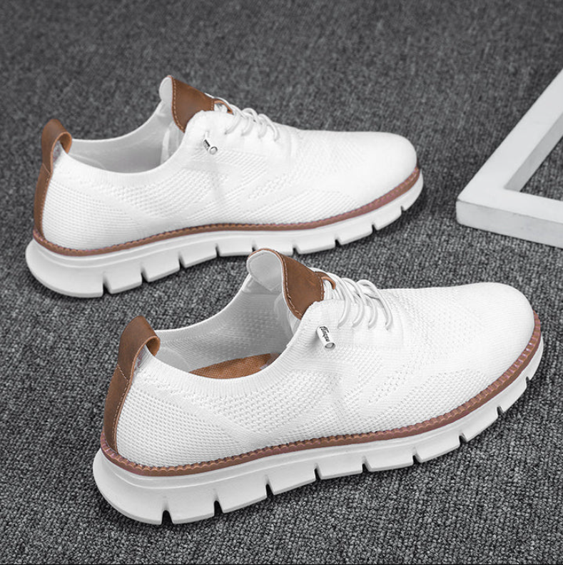 White Free Time running shoes sleek low-top design with cushioned sole for active everyday wear