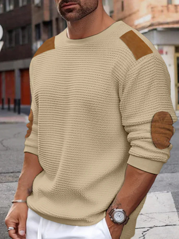 Men's beige waffle knit jumper with relaxed fit, ribbed texture, and sustainable casual style