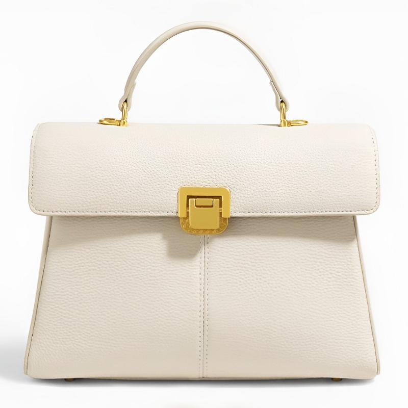 Women's structured top handle leather handbag with secure flap closure for work and travel