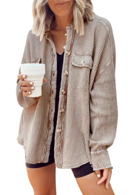 Women's relaxed beige button-front shirt jacket with versatile layering design for casual or polished looks