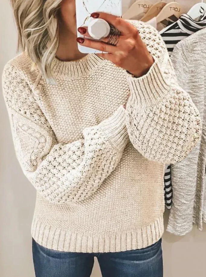 Women's ribbed knit sweater relaxed casual fit with textured stripe detailing in versatile neutral style