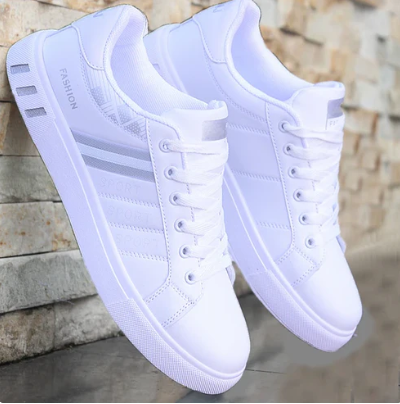 White lightweight athletic sneakers with modern silhouette, cushioned sole for active everyday wear