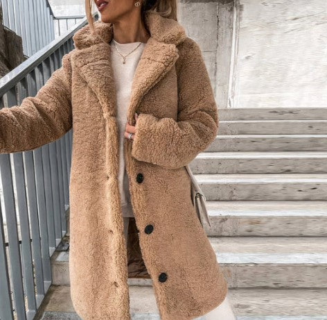 Oversized plush blanket cloak in neutral tones, ultra-soft cozy wrap for cold-weather lounging