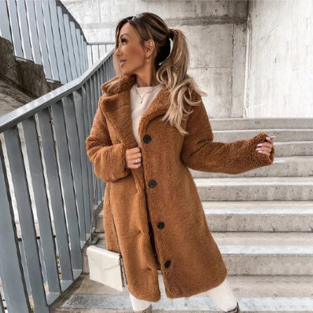Plush blanket cloak in soft neutral tones, ultra-cozy oversized lounge wrap for cold days
