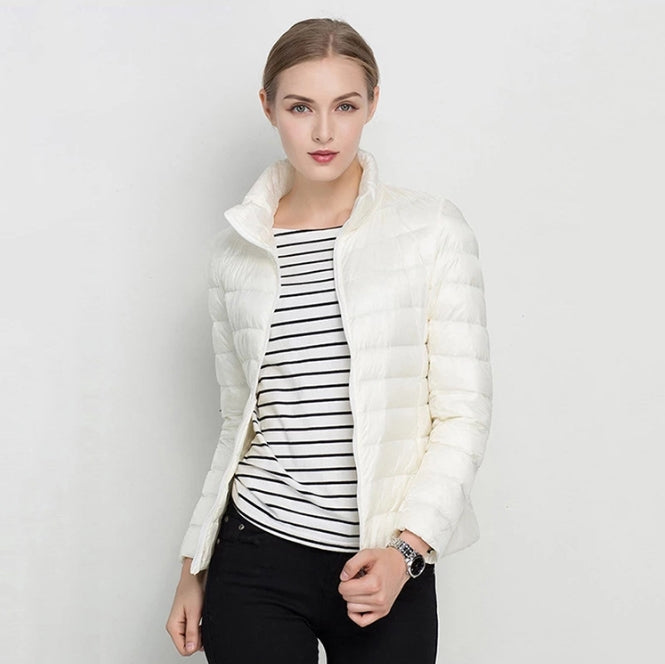 Women's slim-fit quilted jacket insulated zip-front high collar transitional weather outerwear