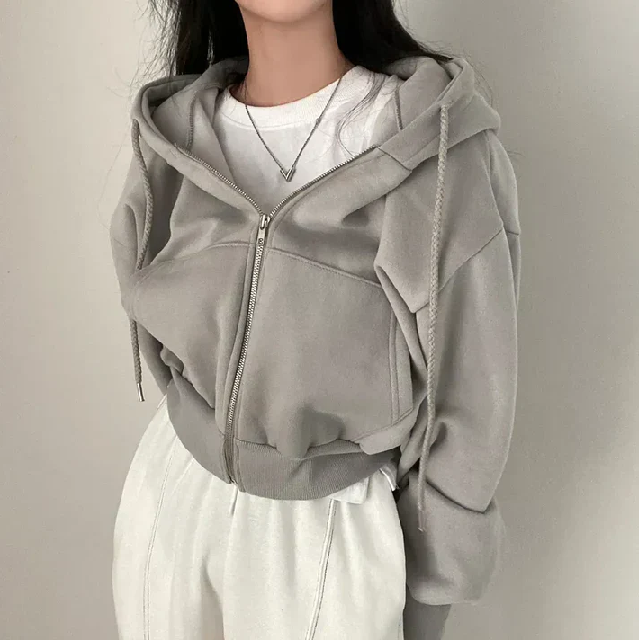 Women oversized zip-up winter jumper cozy soft knitwear sustainable casual silhouette all-day comfort
