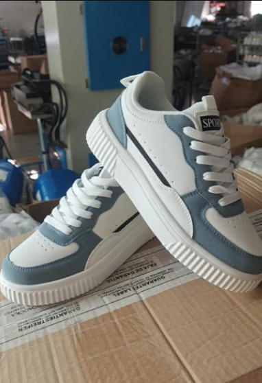 Women's white Tuzede trainers, sleek low-top silhouette with sustainable construction for everyday style