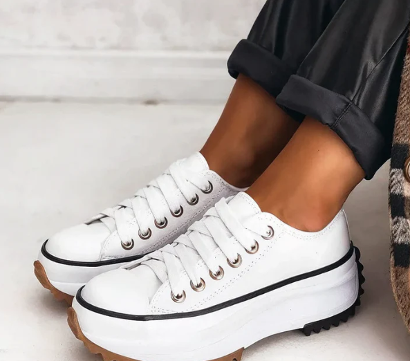 Women's orthopedic platform shoes with supportive insoles, modern style, cushioned comfort, and subtle height boost