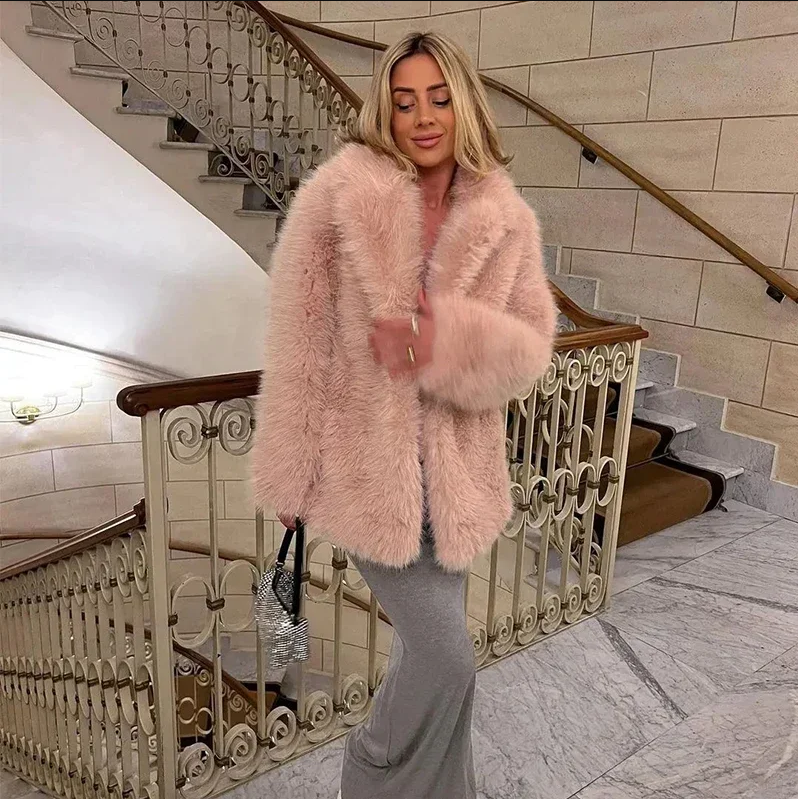 Women's plush faux fur luxury jacket in neutral tone, oversized chic silhouette with ultra-soft cozy texture